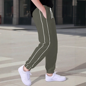 Olive green men's athletic joggers with white side stripes and drawstring waist