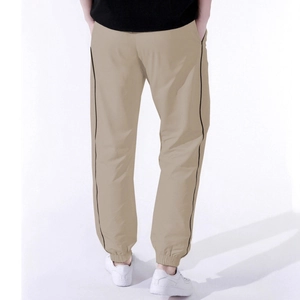 Men's khaki jogger pants with side stripes and ribbed cuffs for high street sport style