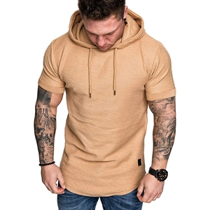 Detail of camel hooded t-shirt showing knitted texture, drawstring, and curved hem