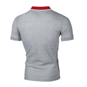 Detail of grey men's polo shirt featuring red collar with white stripes on the back