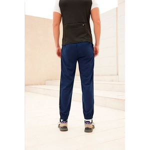 Rear view of men's dark blue joggers featuring side stripes and elastic ankle cuffs