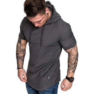 Detailed close-up of dark grey hooded t-shirt showing drawstring hood and curved hemline
