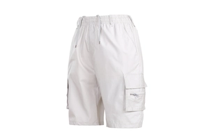 Detail view of beige cargo shorts with elastic waistband and multi-pocket design