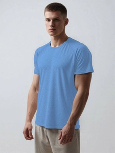 Detail of light blue adaptive shirt fabric texture with snap closure for surgery recovery