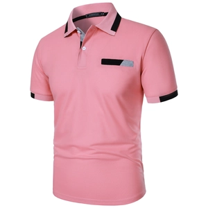 Detail of pink polo shirt featuring black contrast collar and chest pocket texture