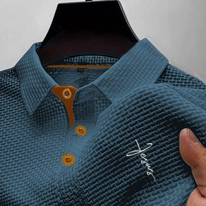 Men's navy waffle knit polo shirt with orange contrast collar and Jesus chest print
