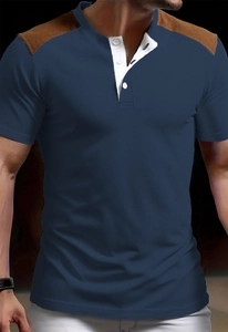 Detail of navy henley shirt featuring brown suede shoulder patches and white button placket