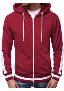 Detail of burgundy zip-up hoodie featuring contrast white tape stripes and ribbed cuffs