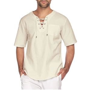 Close-up of the breathable cotton linen texture and lace-up V-neckline with metal accents