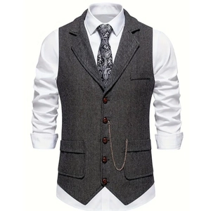 Men's retro dark grey herringbone waistcoat with lapels and a vintage watch chain