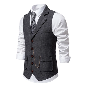 Men's dark grey herringbone suit vest with classic lapel and vintage watch chain