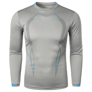 Detail of grey compression shirt with blue accents and moisture-wicking fabric