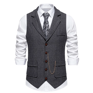 Men's retro dark grey herringbone tweed vest with lapel and gold chain detail