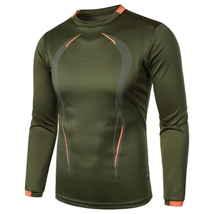 Detail of army green breathable long-sleeved compression gym shirt with orange accents
