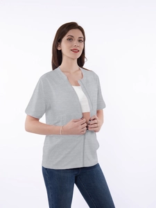 Detail of light gray zip-up recovery shirt with short sleeves and smooth texture
