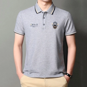 Men's grey business casual polo shirt with embroidered chest logo and striped collar