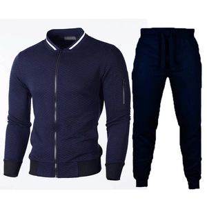 Dark blue men's tracksuit set with zip-up bomber jacket and diamond quilted texture