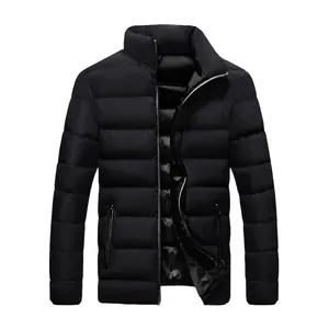 Detail view of black men's padded jacket with quilted pattern and high collar