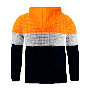 Detail view of the tricolor patchwork hooded sweatshirt with 3D brick texture on the back