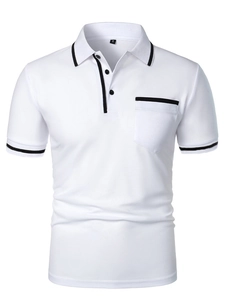 Detail of white polo shirt showing breathable piqué fabric texture and black trim pocket