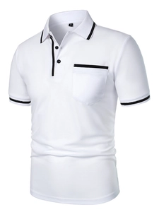 Close-up of men's white polo shirt featuring black contrast trim and chest pocket detail