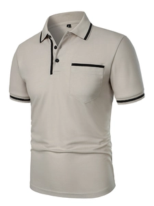 Detailed view of beige polo shirt showing pique texture, buttoned placket and chest pocket