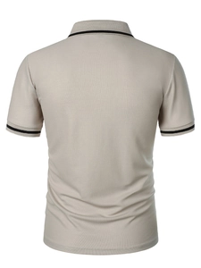 Detailed back view of khaki pique polo shirt with black double stripe trim on collar