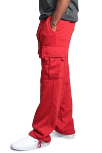 Detail of red cargo sweatpants with side flap pockets and adjustable drawstring cuffs
