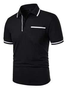 Detail of black men's Polo shirt featuring white contrast piping on pocket and collar