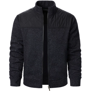 Detail of men's knitted zipper cardigan with quilted nylon shoulder panels and rib cuffs