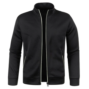 Detail of black sports jacket with contrast zipper piping and ribbed cuffs and hem