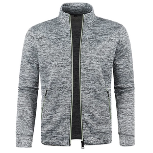 Detailed close-up of a men's gray knit jacket featuring neon green zipper accents and size L tag