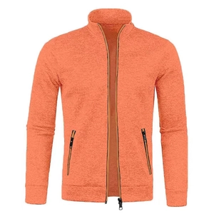 Detail of orange knitted jacket with stand-up collar and vertical zipper pockets
