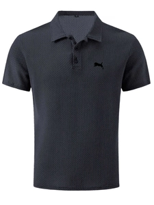 Macro detail of dark grey waffle knit polo shirt showing lapel collar and leopard logo