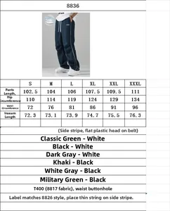 Detailed size guide table for men's high street parachute pants with side stripes