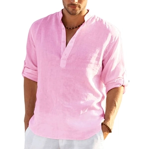 Close-up of pink linen shirt featuring a mandarin collar and adjustable buttoned sleeves