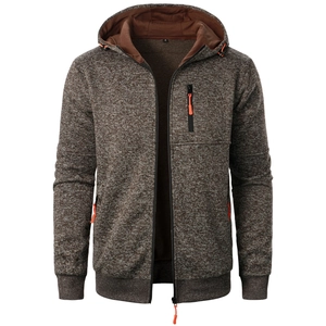 Detailed view of men's knitted heather jacket with orange contrast zipper pockets