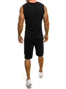 Back view of men's quick-dry sports set with neon green panels and black shorts