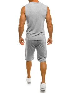 Detail view of moisture-wicking dark grey sleeveless tank top and shorts fitness set