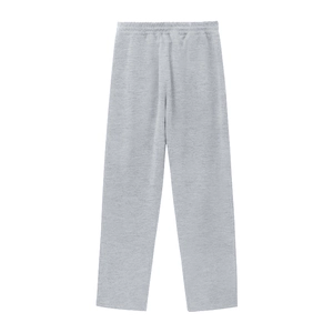 Détail du pantalon de jogging gris montrant la taille élastique et le tissu en maille de coton