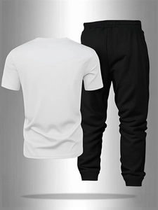 Detail view of breathable white short-sleeve T-shirt and black joggers for men's casual wear