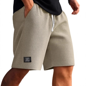 Pantaloncini casual da uomo in maglia a nido d'ape beige con coulisse elastica e toppa