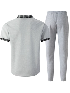Detail view of men's grey waffle knit set showing back of short sleeve shirt and long pants