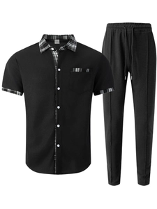 Detail view of waffle texture fabric and checkered trim on black men's shirt collar