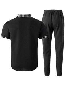 Rear view of black waffle knit men's set featuring plaid trim on sleeves and waistband
