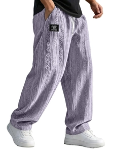 Close-up of lavender knit pants with classic wear label and white drawstring detail