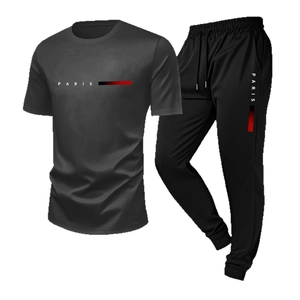 Men's summer casual tracksuit with grey Paris t-shirt and black pants on white background