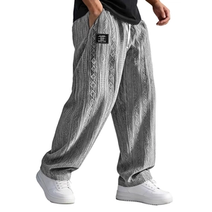 Men's loose straight-leg knit trousers in off-white textured fabric with drawstring