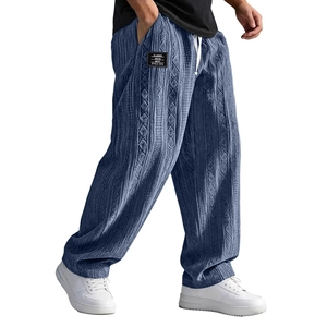 Men's blue knit trousers with jacquard texture and relaxed wide leg straight fit