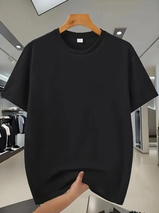Detail view of men's black breathable waffle knit T-shirt on a wooden hanger